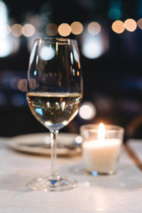a glass of wine on the table